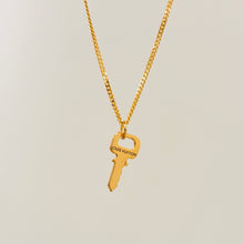 Load image into Gallery viewer, Authentic repurposed Louis Vuitton engraved key necklace
