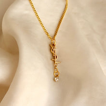 Load image into Gallery viewer, Authentic repurposed YSL logo crystal necklace

