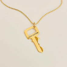 Load image into Gallery viewer, Authentic repurposed Louis Vuitton key necklace
