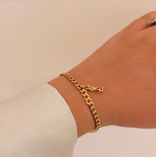 Load image into Gallery viewer, Authentic repurposed YSL logo bracelet

