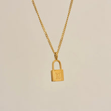 Load image into Gallery viewer, Authentic repurposed Louis Vuitton logo lock necklace
